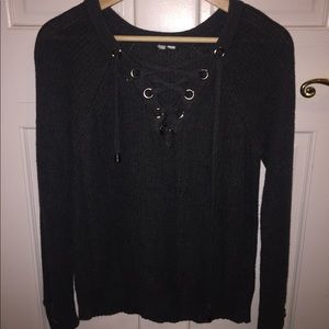 Woman’s grey sweater